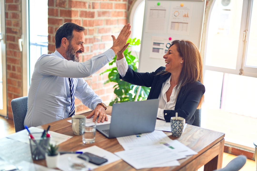 Business team collaborating in an office for outsourcing and offshore support