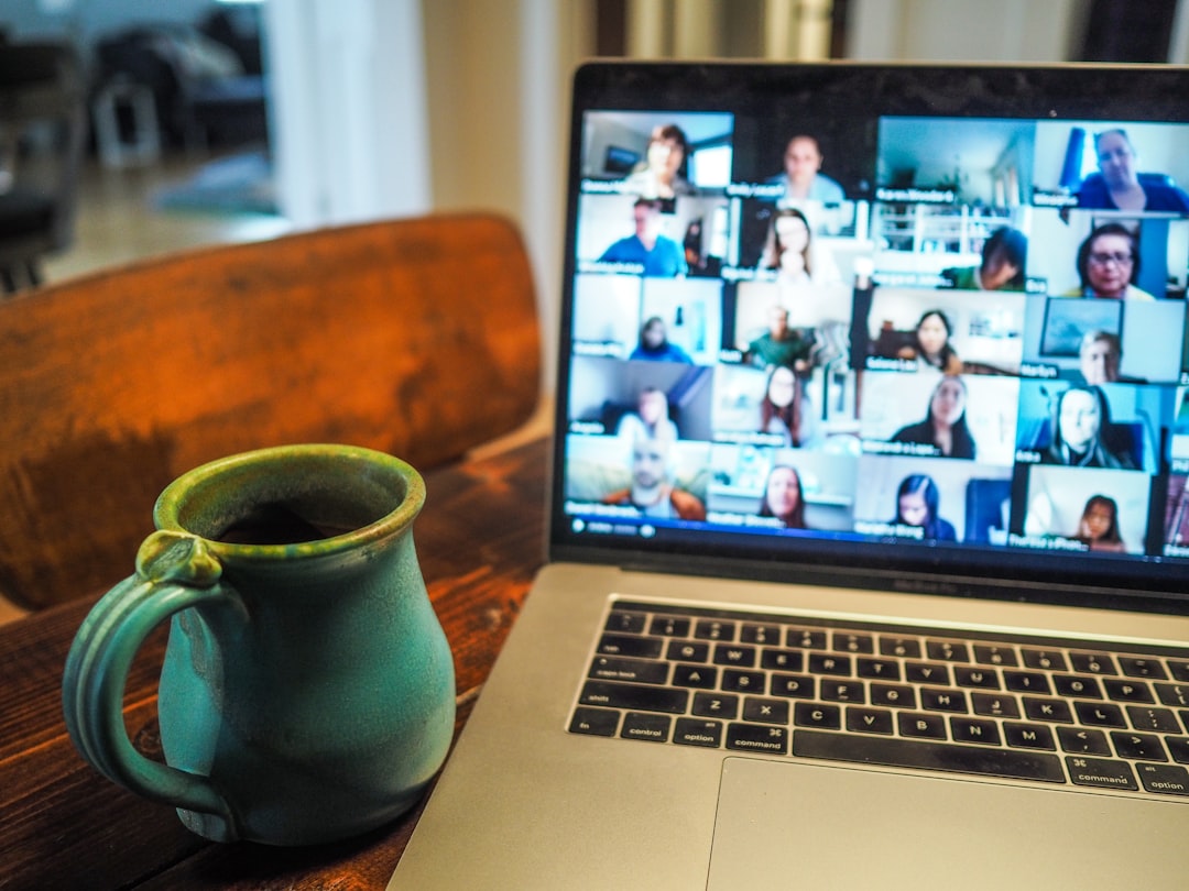 Remote offshore team collaborating across time zones through a video meeting