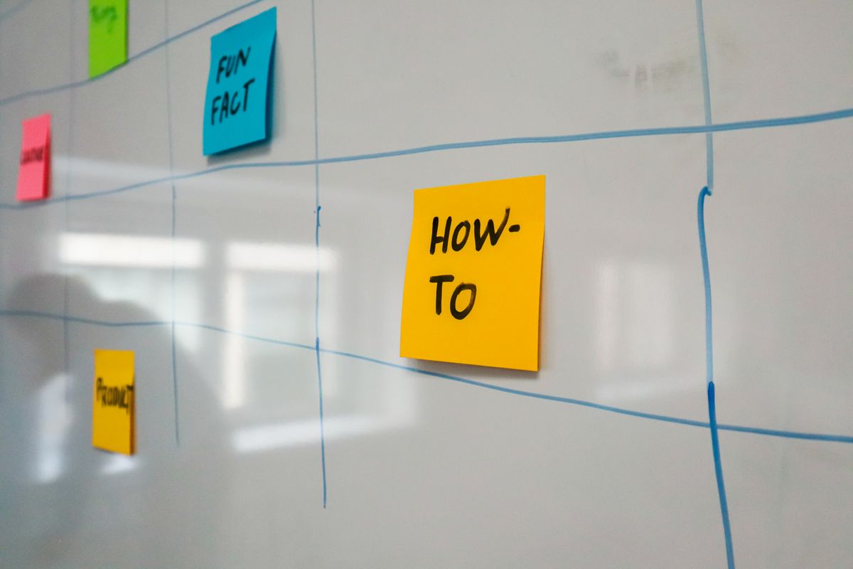 Sticky notes on a schedule board