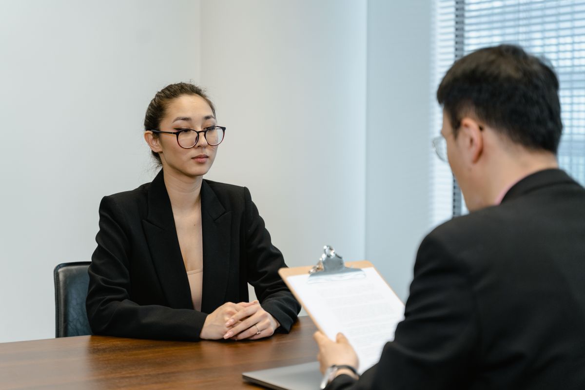 Colleagues discussing plans in a meeting