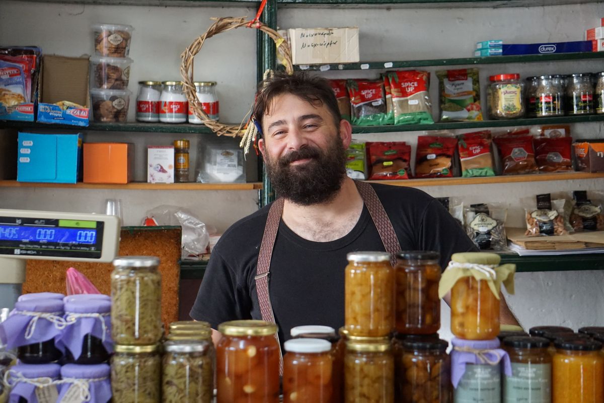 Smiling shop owner in her store